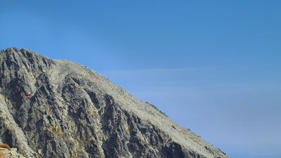 Wagonik kolejki linowej na Łomnicę na tle Huncowskiego Szczytu