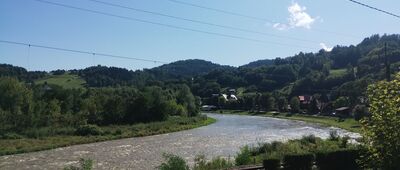 Piwniczna-Zdrój, ul. Daszyńskiego ↔ Piwniczna-Zdrój, skrzyżowanie [Widok na Poprad z poziomu ulicy]